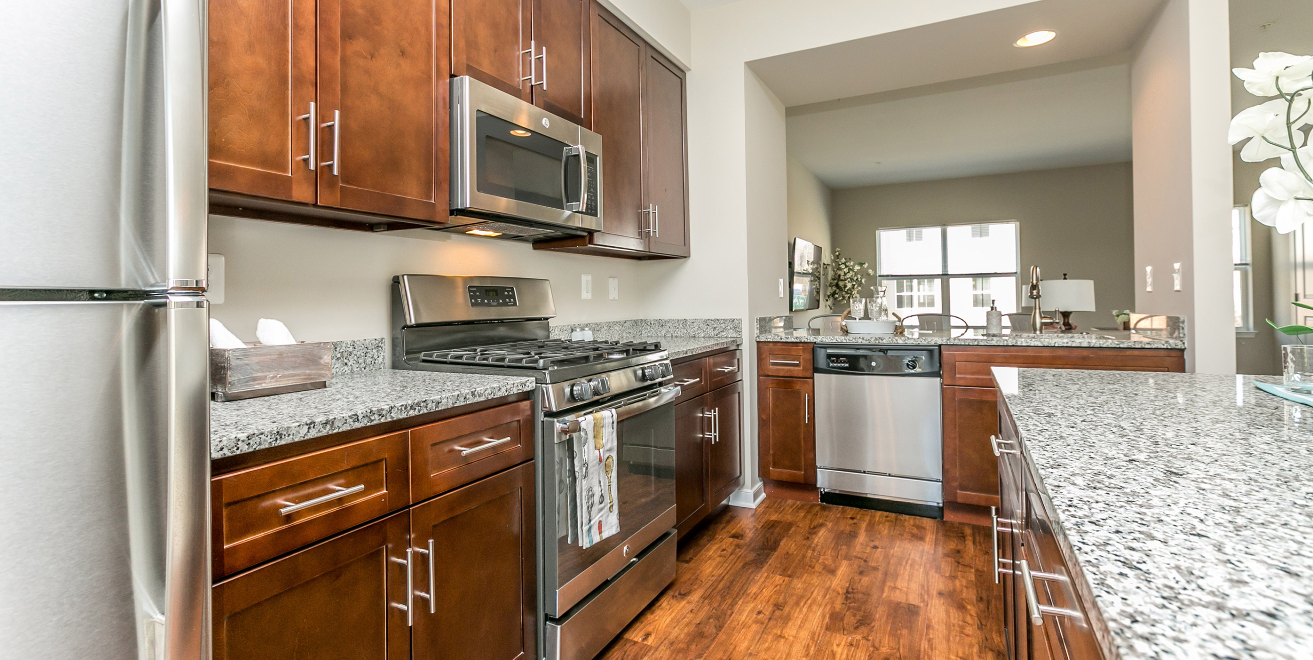 The Townes at Pine Orchard kitchen with mahogany cabinetry