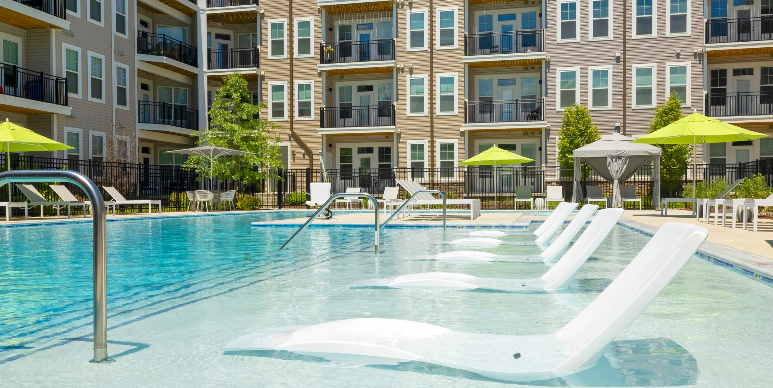 The Refinery pool with lounge chairs in water