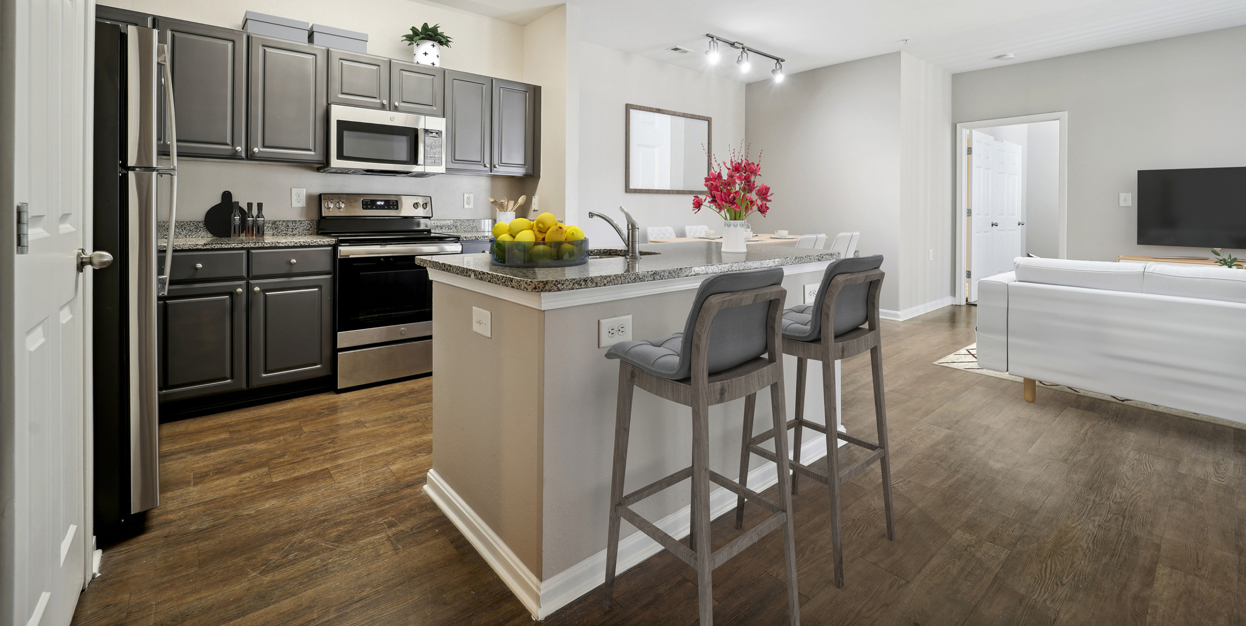 kitchen island with seating and gray cabinets