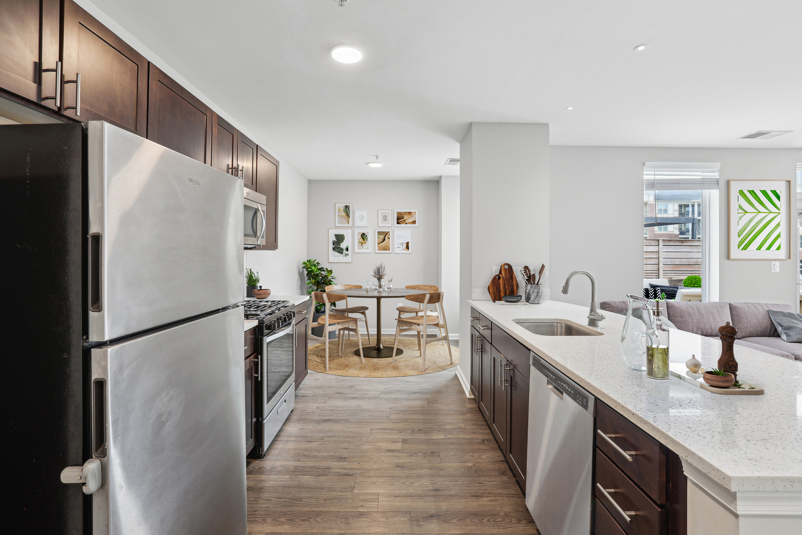 Galley kitchen with stainless steel appliances