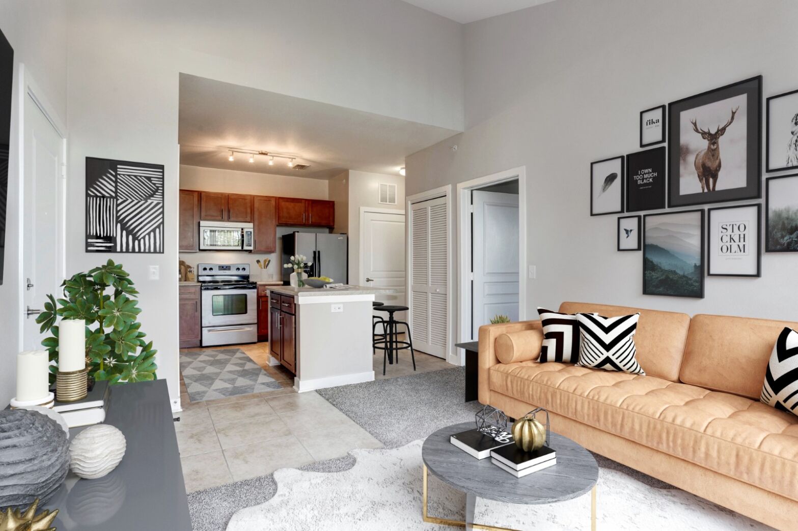 Living room with sofa and view into kitchen